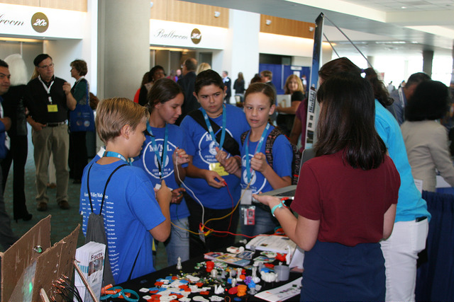 a group of children at one of the California STEAM Symposium Booths